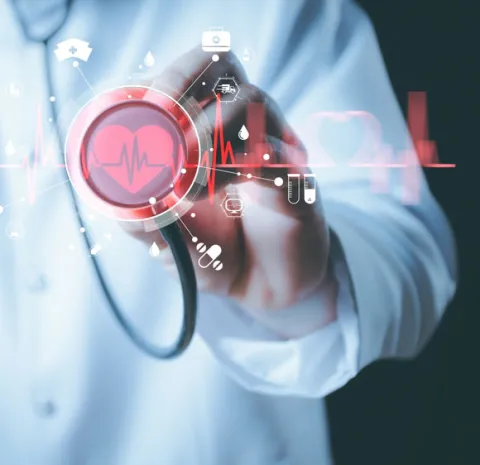 Imagen ilustrativa de médico con aparato cardíaco